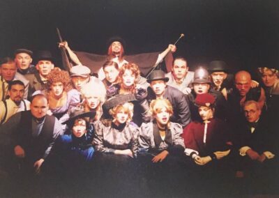 23 member cast of a theatrical production